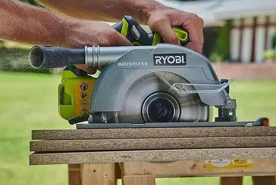 Man Using Ryobi Cordless Circular Saw