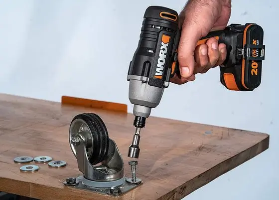 Man Using WORX Cordless Impact Driver