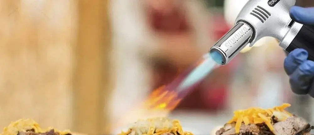 Blow Torch Jet Flame On Meat