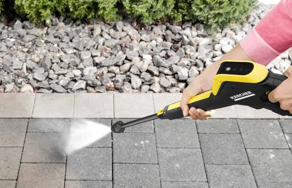 Jet Pressure Washer On Driveway