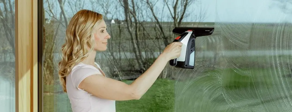 Electric Window Cleaner On Glass Surface