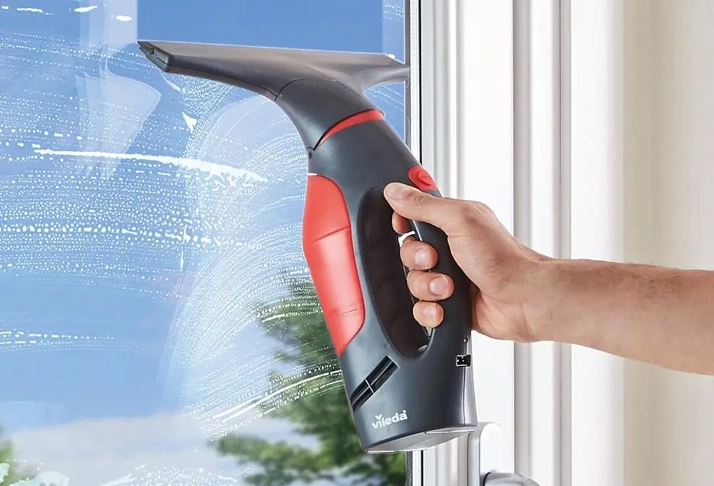 VILEDA Window Vacuum Cleaner On Glass Surface