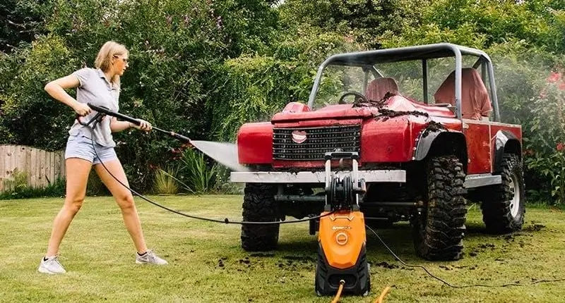 Yard Force Portable Pressure Washer On Lawn